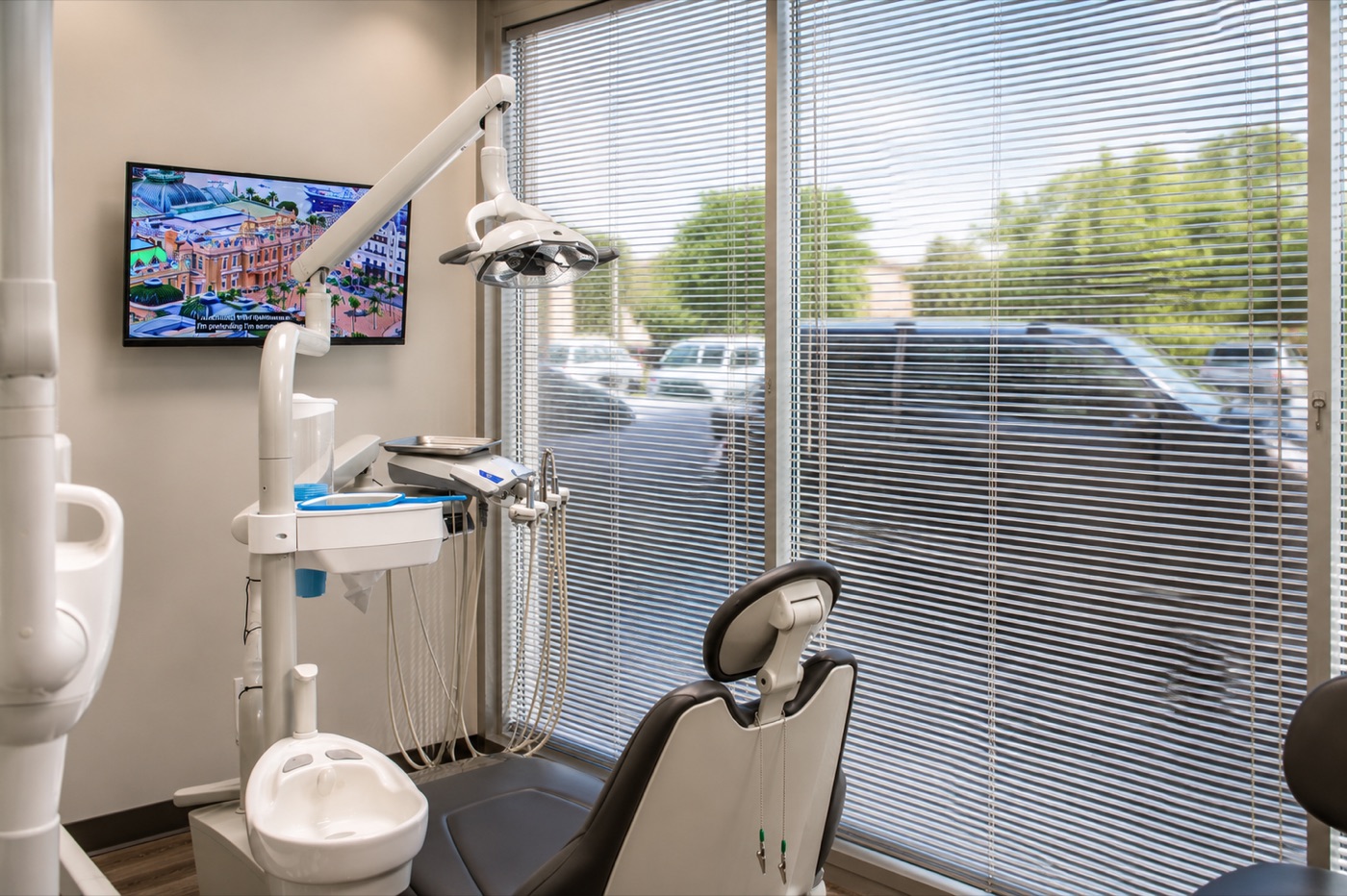 Treatment room with chair, overhead light and window